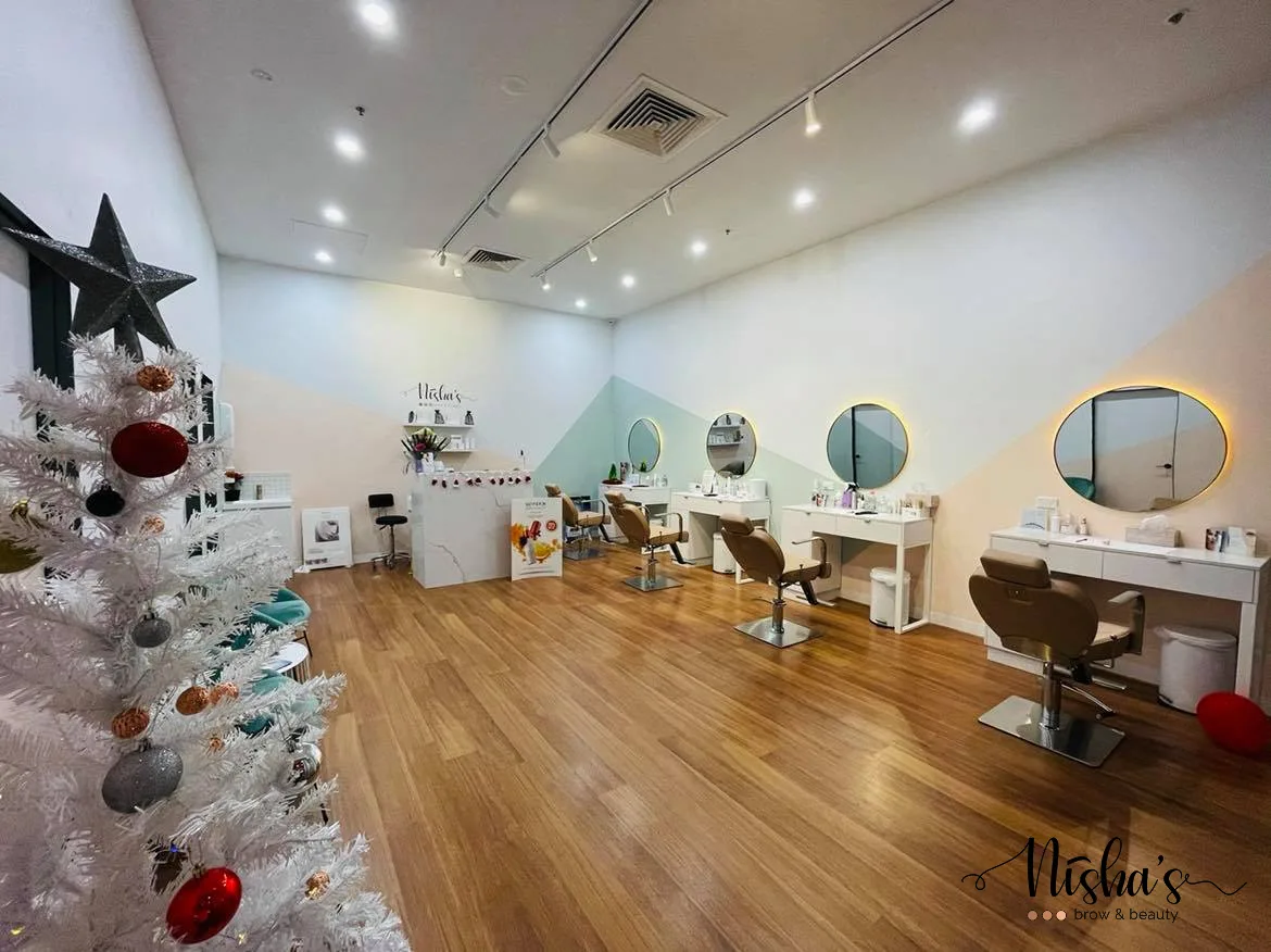 The Nisha's Brow & Beauty studio floor with mirror stations